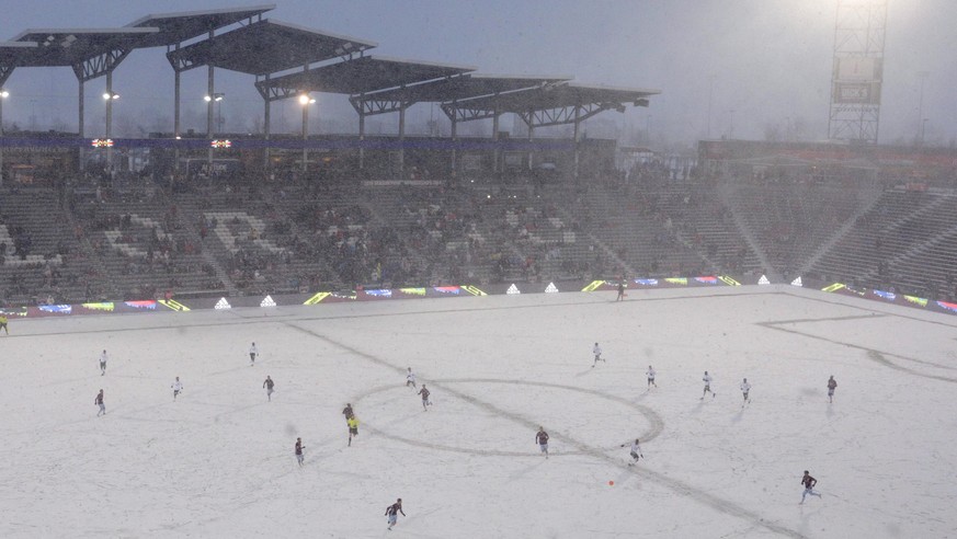 The Colorado Rapids play the Portland Timbers on a snow-covered pitch during the second half of an MLS soccer game Saturday, March. 2, 2019 in Commerce City, Colo. (AP Photo/Joe Mahoney)