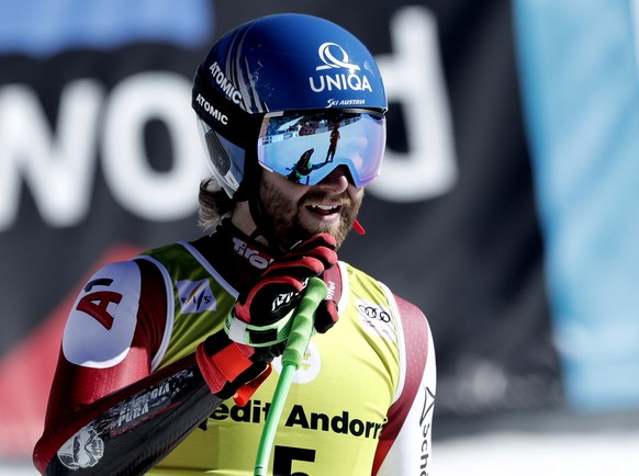 epa10525882 Marco Schwarz of Austria reacts in the finish area after his run in the Men&#039;s Super G race at the FIS Alpine Skiing World Cup finals in the skiing resort of El Tarter, Andorra, 16 Mar ...