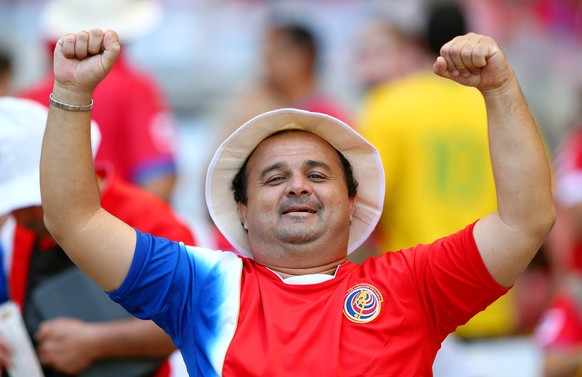 BELO HORIZONTE, BRAZIL - JUNE 24: A Costa Rica fan enjoys the atmosphere prior to the 2014 FIFA World Cup Brazil Group D match between Costa Rica and England at Estadio Mineirao on June 24, 2014 in Belo Horizonte, Brazil. (Photo by Quinn Rooney/Getty Images)