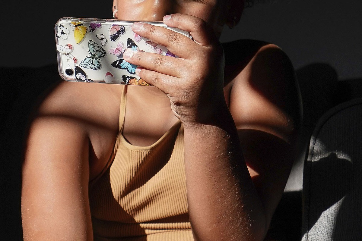 FILE - A girl uses her smartphone at home in Arizona on Friday, June 16, 2023. (AP Photo/Darryl Webb, File)
FTC Chatbot AI