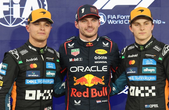 epa12574539 Polesitter Red Bull Racing driver Max Verstappen (C) of Netherlands, second place McLaren driver Lando Norris (L) of Britain and third place McLaren driver Oscar Piastri (R) of Australia p ...