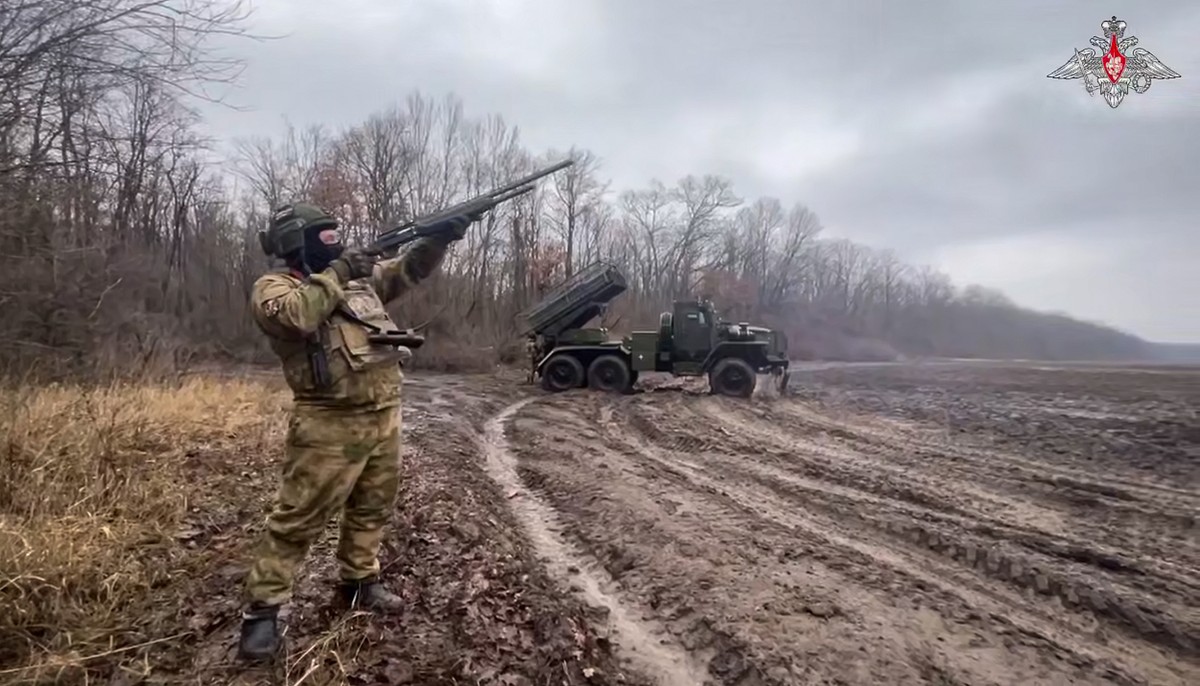 In this photo, taken from video and released by Russian Defense Ministry Press Service on Thursday, Jan. 16, 2025, a Russian soldier guards a "Grad" self-propelled multiple rocket launcher&# ...