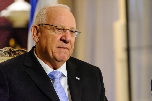 President of Israel Reuven Rivlin pauses during a meeting with New York City Mayor Bill de Blasio and NYPD Commissioner William Bratton at the Park Lane Hotel, in New York, on Wednesday, Jan. 28, 2015 ...