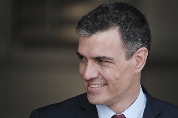 epa09331105 Spanish Prime Minister Pedro Sanchez after a press conference was interrupted due to an Alpha Scramble over a possible air threat, during their visit to Military Air Base in Sauliai, Lithu ...