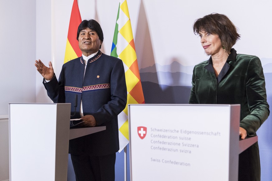 Swiss President Doris Leuthard, right, and President of Bolivia Evo Morales hold a joint press conference, Thursday, Dec. 14, 2017 after their meeting in Bern, Switzerland. Morales is on an official w ...