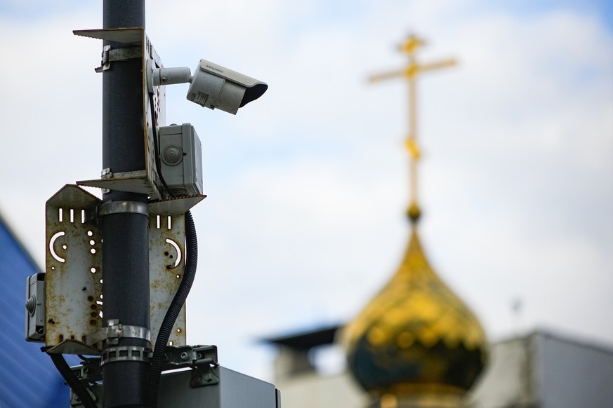FILE - A surveillance camera sits on a utility pole in Moscow, Russia, Sunday, May 21, 2023. It&#039;s becoming increasingly difficult for Russians to escape government scrutiny. Activists say Putin?s ...