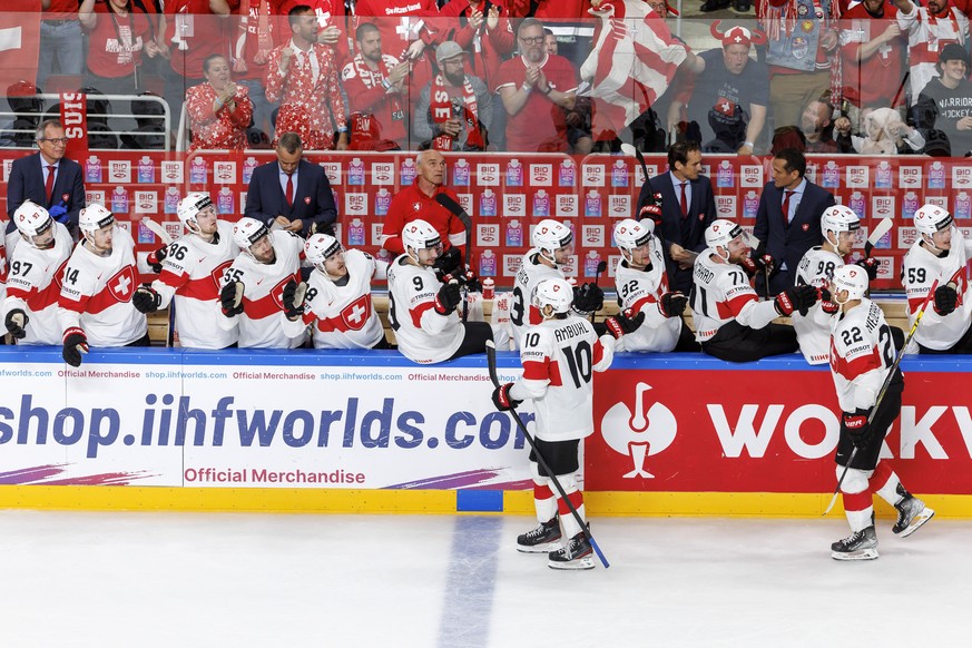 Switzerland&#039;s forward Andres Ambuehl #10 and Switzerland&#039;s forward Nino Niederreiter #22, celebrate the Ambuehl&#039;s goal with their teammates after scoring the 1:3, during the IIHF 2023 W ...