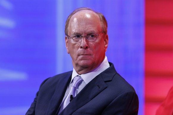 epa11658965 CEO of BlackRock, Larry Fink participates in a panel talk at the International Investment Summit at the Guildhall in London, Britain, 14 October 2024. According to the British government,  ...
