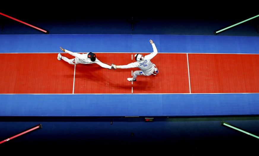 2016 Rio Olympics - Fencing - Final - Men&#039;s Epee Individual Bronze Medal Bout - Carioca Arena 3 - Rio de Janeiro, Brazil - 09/08/2016. Gauthier Grumier (FRA) of France (R) competes with Benjamin  ...