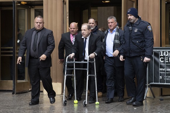 Harvey Weinstein leaves court following a hearing, Wednesday, Dec. 11, 2019 in New York. WeinsteinÄôs bail was increased from $1 million to $5 million on Wednesday over allegations he violated bail c ...