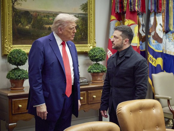 epa12308711 A handout photo made available by the Presidential Press Service shows United States President Donald J Trump (R) meets President of Ukraine Volodymyr Zelensky (L) in the Oval Office of th ...