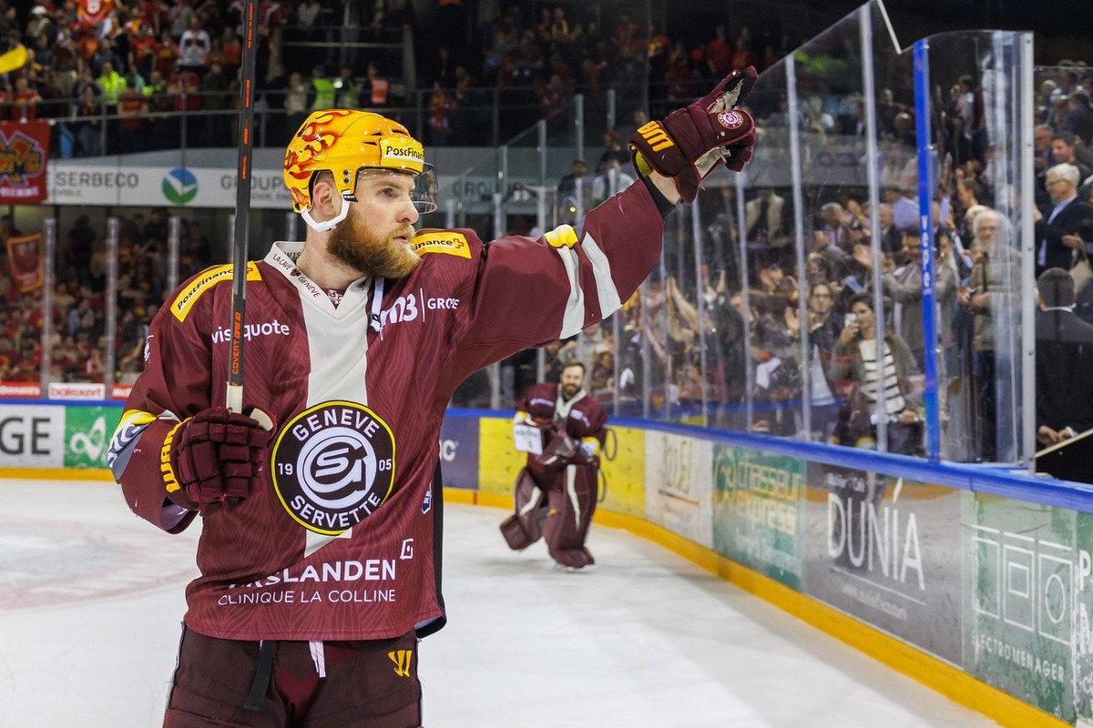 Geneve-Servette's forward Tanner Richard celebrates after defeating the team Biel-Bienne, during the fifth leg of the National League Swiss Championship final playoff game between Geneve-Servette ...