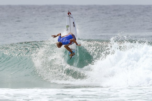 epa05852244 A handout photo made available by the World Surf League (WSL) on 16 March 2017 of Owen Wright of Australia in action during heat 12 of round 1 at the Quiksilver Pro Gold Coast surfing even ...