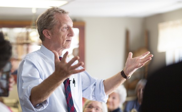 epa07820604 Democratic candidate for United States President, Businessman Tom Steyer, speaks to the Salem New Hamsphire Democrats during their weekly meeting at the Farmhouse Roasters in Salem, New Ha ...