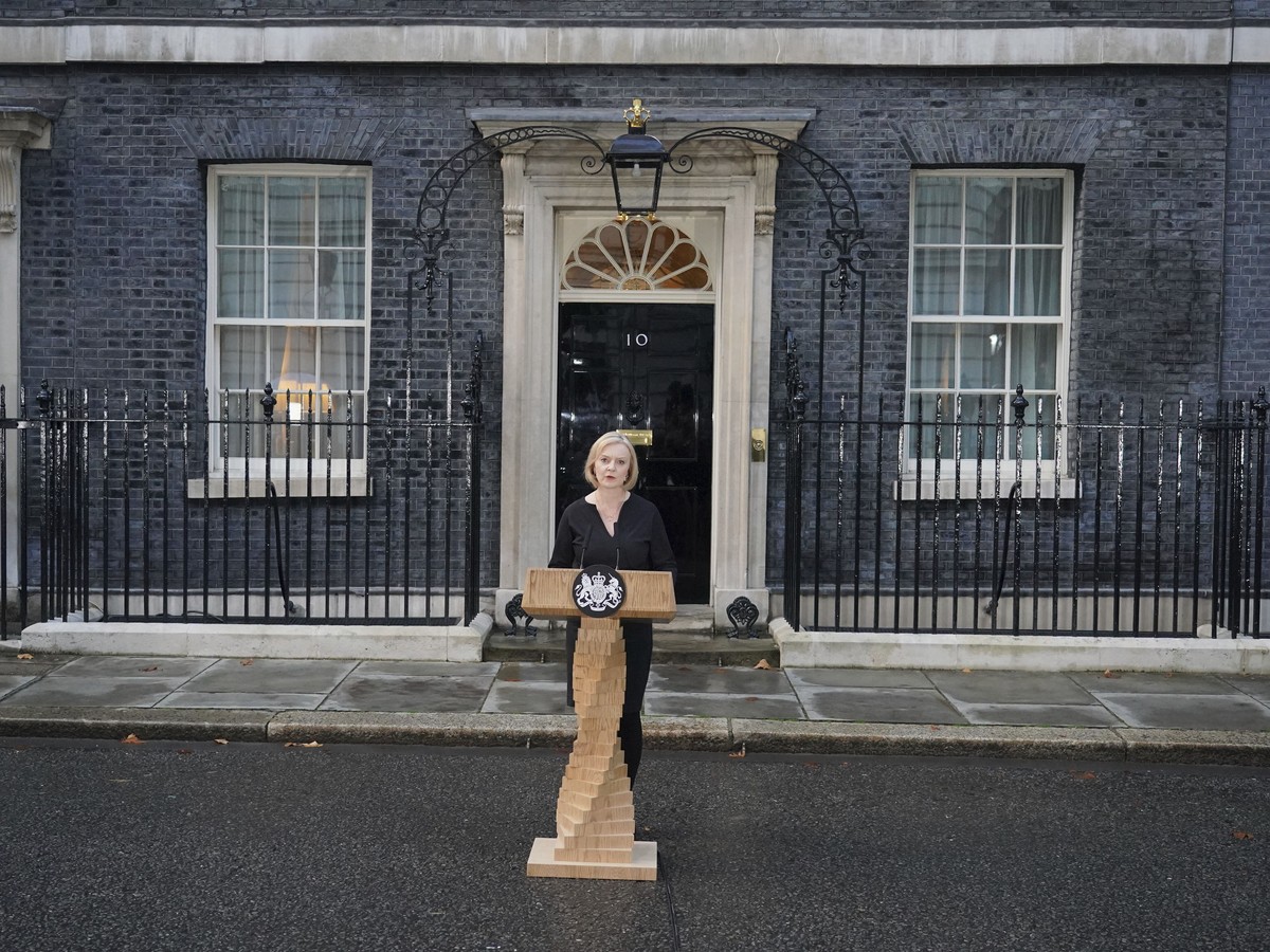 Britain's Prime Minister Liz Truss reads a statement outside 10 Downing Street, London, Thursday Sept. 8, 2022, following the announcement of the death of Queen Elizabeth II. Queen Elizabeth II,  ...