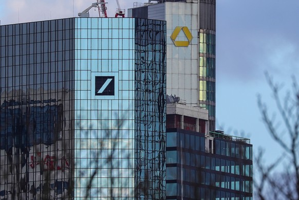 epa07447136 An outside view of the Deutsche Bank (L) and the Commerzbank headquarters in Frankfurt am Main, Germany, 18 March 2019. Germany&#039;s two biggest lenders Deutsche Bank and Commerzbank hav ...