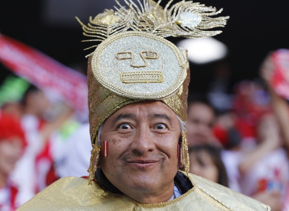 A Peru national team&#039;s fan poses for a photo prior to the group C match between Peru and Denmark at the 2018 soccer World Cup in the Mordovia Arena in Saransk, Russia, Saturday, June 16, 2018. (A ...