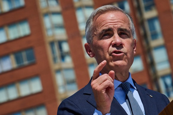 Prime Minister Mark Carney speaks at a housing announcement in Toronto, on Wednesday, Aug. 5, 2026. (Sammy Kogan/The Canadian Press via AP)
Canada Carney Housing