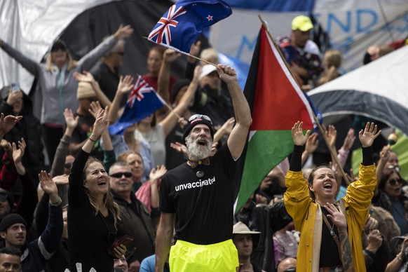 People who oppose vaccine mandates protest near Parliament in Wellington, New Zealand Monday, Feb. 14, 2022. The protesters are not planning to leave any time soon after they drove in convoys from aro ...