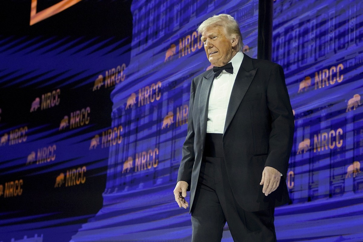 President Donald Trump arrives to speak at the National Republican Congressional Committee (NRCC) dinner at the National Building Museum in Washington, Tuesday, April 8, 2025. (Pool via AP)