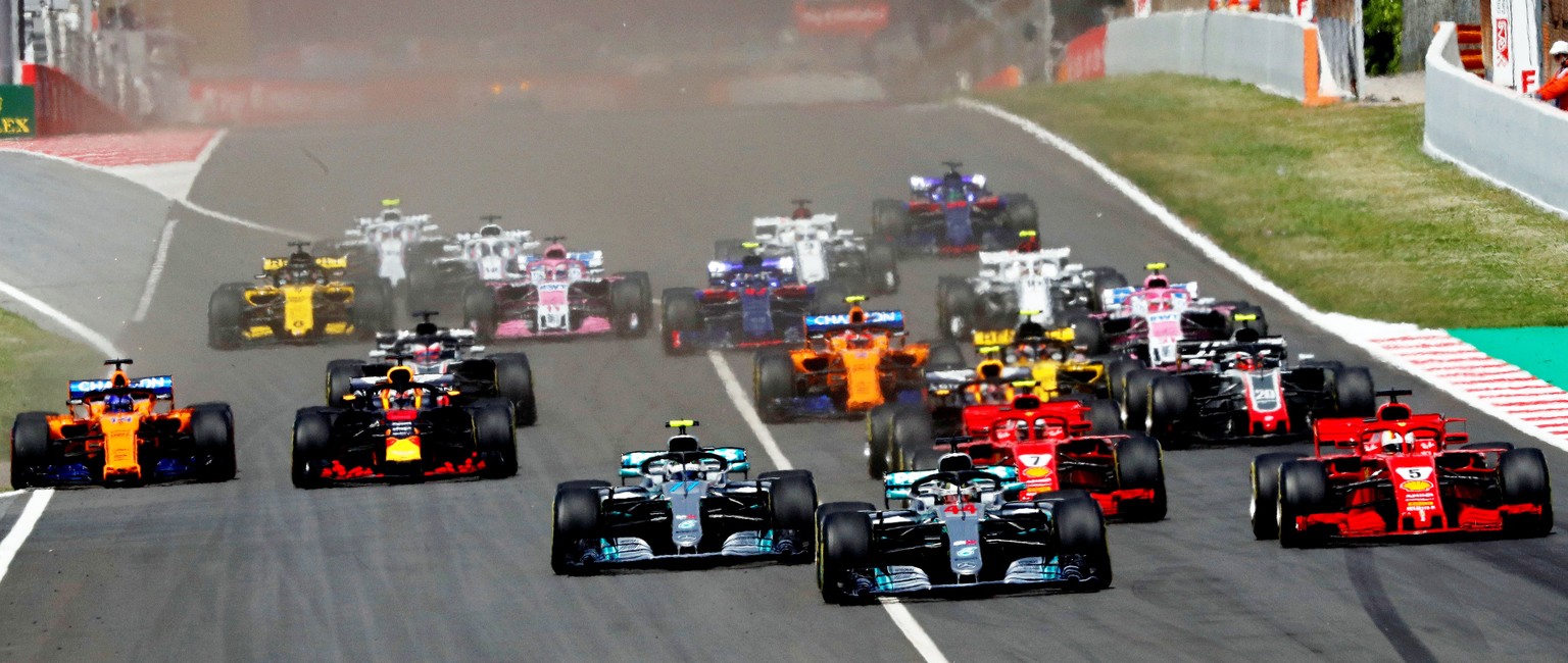 epa06733059 British Formula One driver Lewis Hamilton (C-R) of Mercedes AMG GP leads the pack during the Formula One Grand Prix of Spain at the Circuit de Barcelona-Catalunya race track in Montmelo, o ...