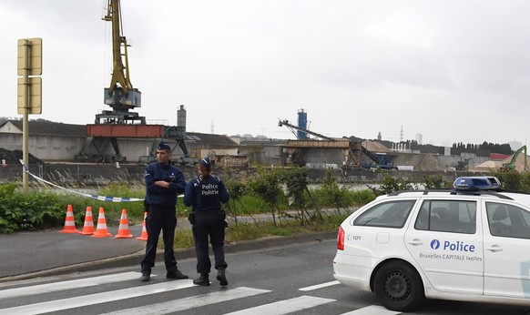 Police seal off an area around the National Criminology Lab in Brussels on Monday, Aug. 29, 2016. Belgian media initially reported an explosion rocked the building in the early hours of Monday. Howeve ...