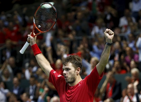 Switzerland&#039;s Stan Wawrinka celebrates winning during his Davis Cup World Group play-off tennis match against Thiemo de Bakker of the Netherlands at the Palexpo Arena in Geneva September 18, 2015 ...