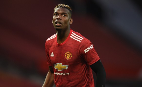 epa09115992 Paul Pogba of Manchester United reacts during the English Premier League soccer match between Manchester United and Brighton Hove Albion in Manchester, Britain, 04 April 2021. EPA/Oli Scar ...