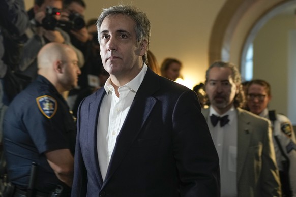 FILE - Michael Cohen arrives at New York Supreme Court, Wednesday, Oct. 25, 2023, in New York. Former Trump lawyer and fixer Michael Cohen says he unwittingly passed along to his attorney bogus artifi ...