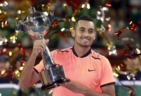 Nick Kyrgios of Australia poses after beating David Goffin of Belgium at the final match of Japan Open tennis tournament in Tokyo, Sunday, Oct. 9, 2016. (AP Photo/Shizuo Kambayashi)