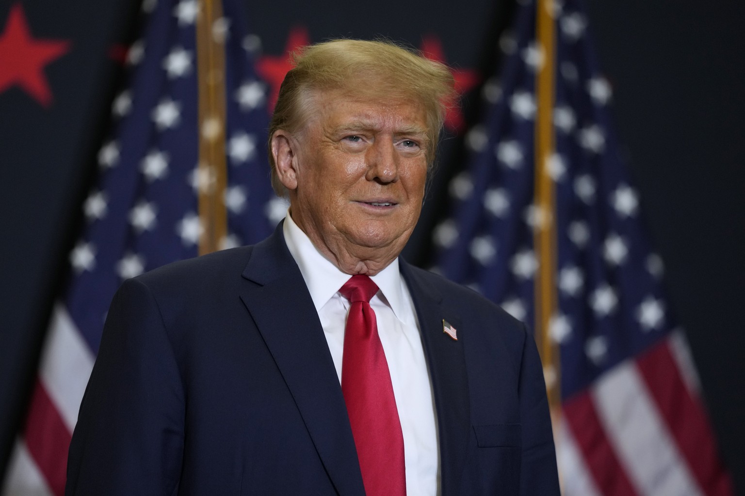 Former President Donald Trump speaks during a commit to caucus rally, Tuesday, Dec. 19, 2023, in Waterloo, Iowa. (AP Photo/Charlie Neibergall)