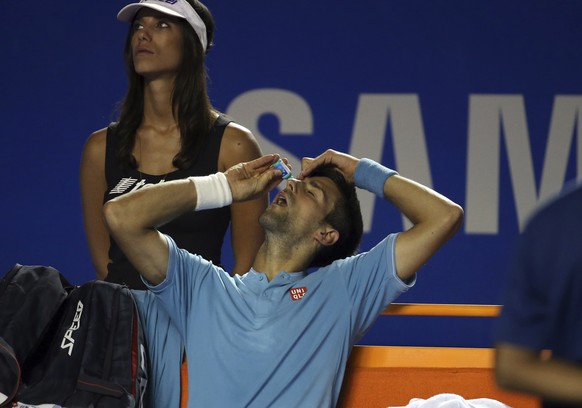 Serbia&#039;s Novak Djokovic puts eye drops during a break at the quarterfinal match of the Mexican Tennis Open against Australia&#039;s Nick Kyrgios in Acapulco, Mexico, Thursday March 2, 2017. Kyrgi ...