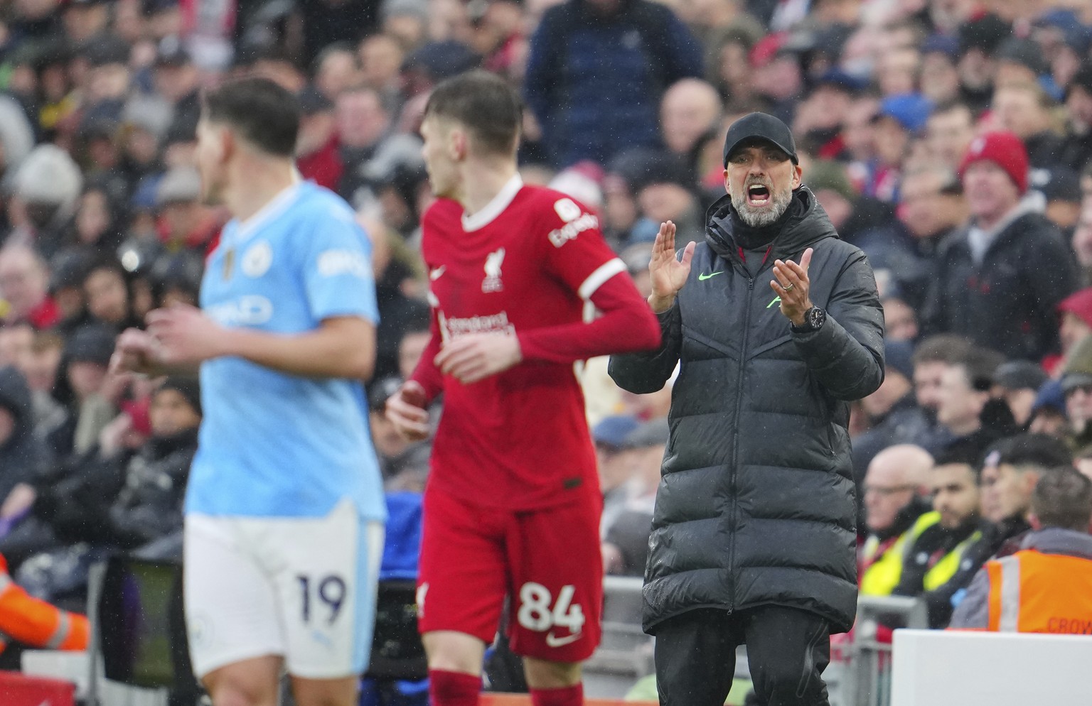 Liverpool&#039;s manager Jurgen Klopp instructs his players during the English Premier League soccer match between Liverpool and Manchester City, at Anfield stadium in Liverpool, England, Sunday, Marc ...