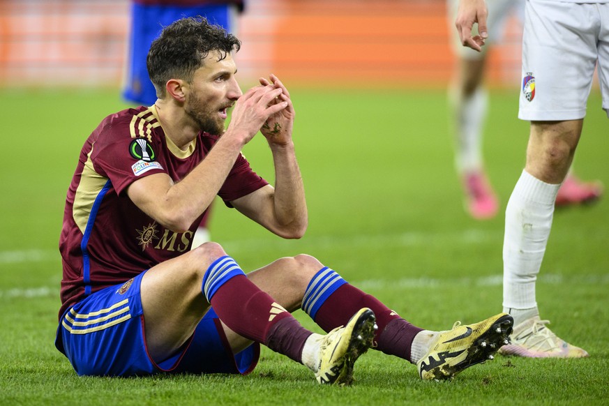 Servette&#039;s midfielder Miroslav Stevanovic reacts after missing an actionn during the UEFA Europa Conference League round of 16 first leg soccer match between Switzerland&#039;s Servette FC and Cz ...