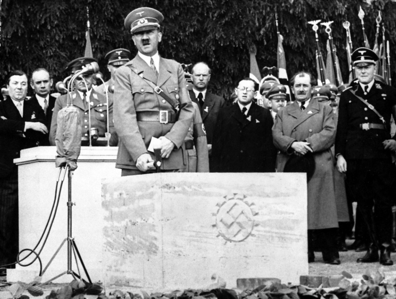 Adolf Hitler lays the cornerstone to the scheduled people&#039;s car factory at Fallersleben near Hanover, Germany, May 26, 1938. The plant is to produce the &quot;cheap people&#039;s&quot; car, suppo ...
