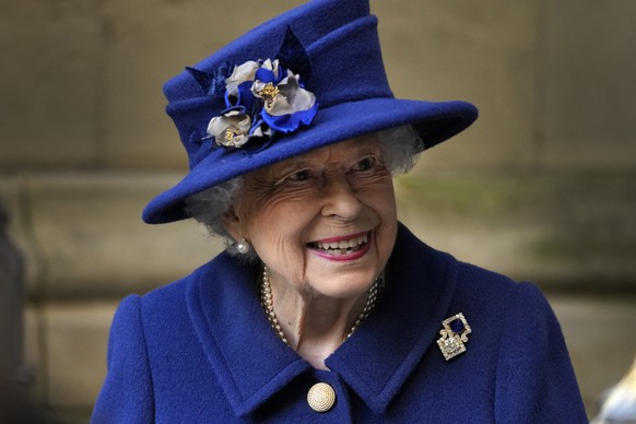 FILE - Britain&#039;s Queen Elizabeth II, Patron, leaves after attending a Service of Thanksgiving to mark the Centenary of the Royal British Legion at Westminster Abbey in London, Oct. 12, 2021. Buck ...