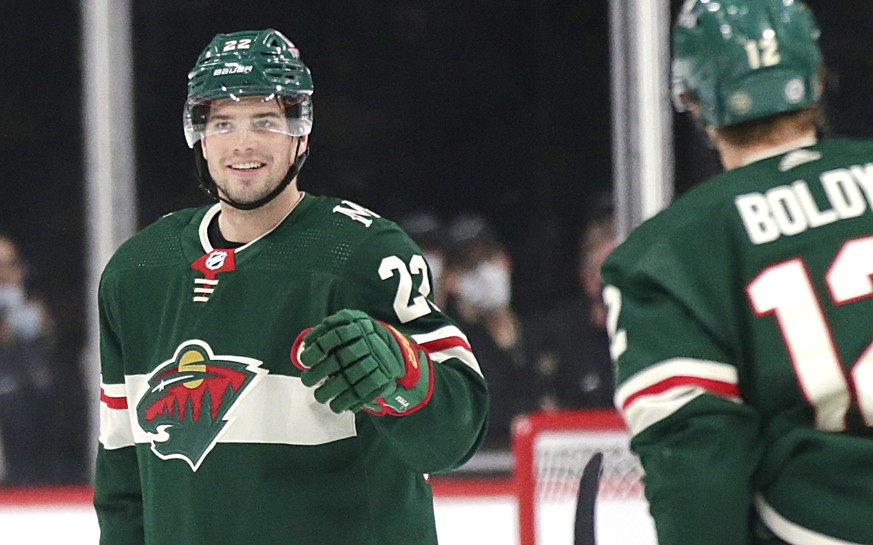 Minnesota Wild left wing Kevin Fiala (22) celebrates with left wing Matt Boldy (12) after scoring a goal against the New York Rangers during the second period of an NHL hockey game Tuesday, March 8, 2 ...