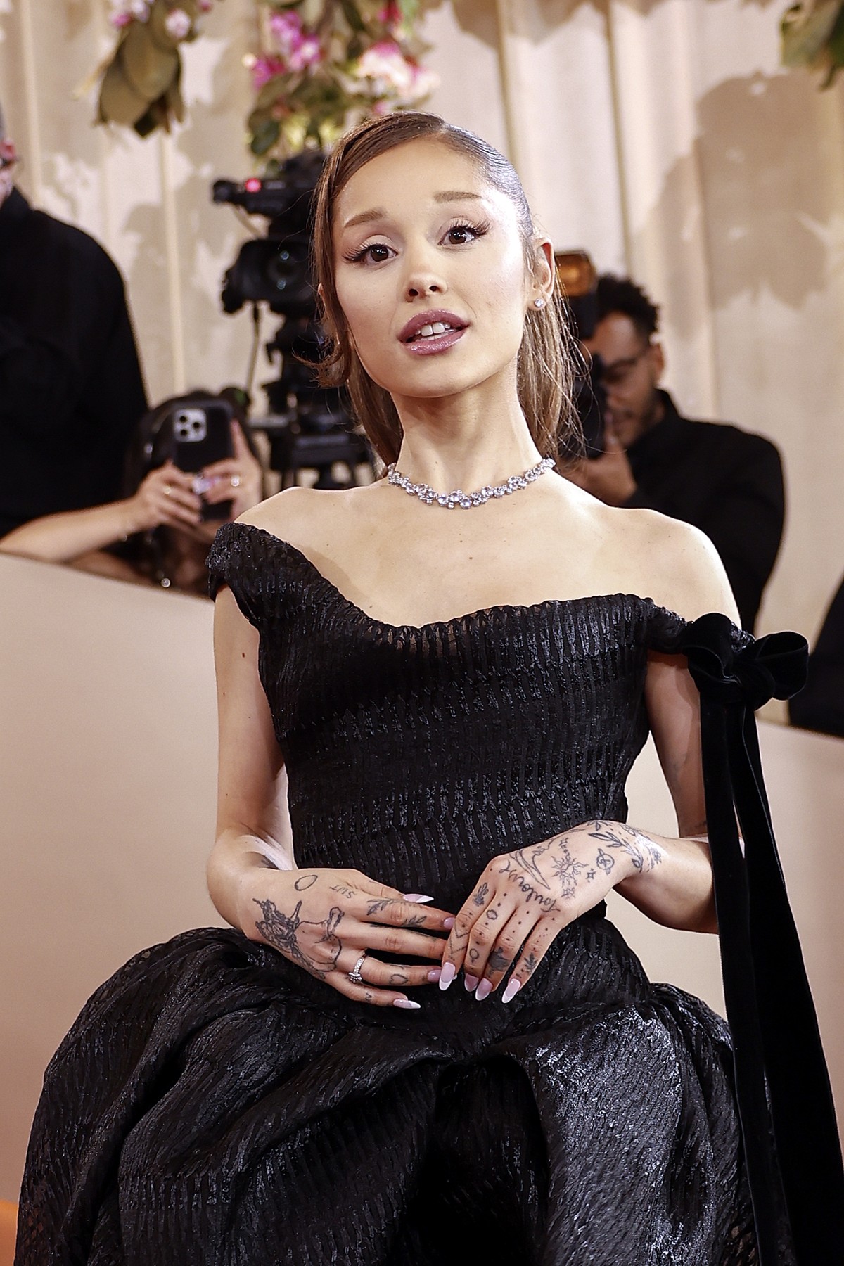 epa12643663 US singer Ariana Grande arrives for the 83rd annual Golden Globe Awards ceremony at the Beverly Hilton Hotel in Beverly Hills, California, USA, 11 January 2026. The Golden Globe Awards rec ...