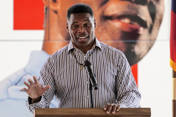 FILE - Republican candidate for U.S. Senate Herschel Walker speaks during a campaign stop in Dawsonville, Ga., Oct. 25, 2022. A woman came forward Wednesday, Oct. 26, to accuse Walker of encouraging a ...