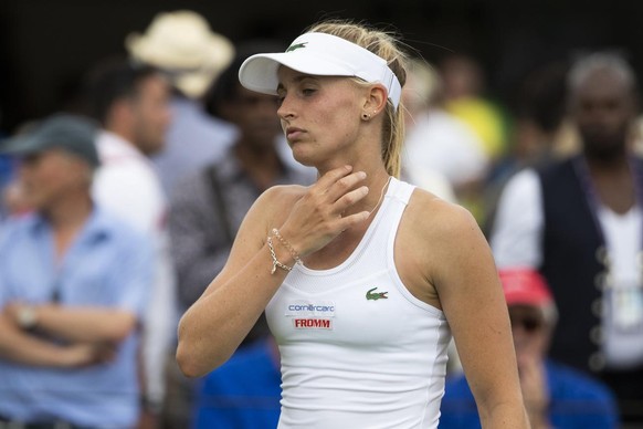 Jil Teichmann of Switzerland reacts during her first round match against Anastasia Potapova of Russia, at the All England Lawn Tennis Championships in Wimbledon, London, on Monday, July 1, 2019.(KEYST ...