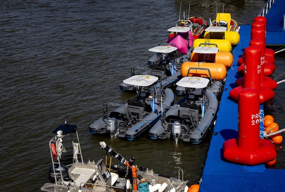 PARIS - The River Seine at Pont Alexandre III, the start and finish area of the triathlon in the French capital. The decision on whether to continue with the men s triathlon at the Olympic Games will  ...