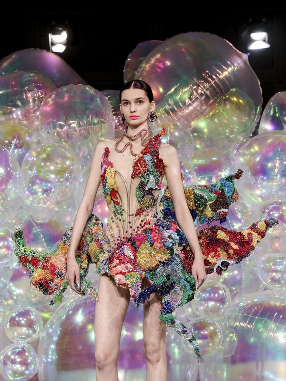 epa12229886 A model presents a creation from the Haute Couture Autumn/Winter 2025/2026 collection by Swiss designer Kevin Germanier for his label Germanier during Paris Fashion Week, in Paris, France, ...