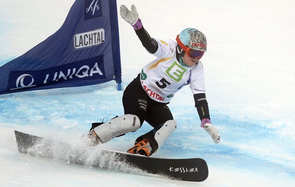 Switzerland's Julie Zogg competes to place sixth at the women's parallel slalom event at the Freestyle Ski and Snowboard World Championships in Lachtal, Austria, Thursday, Jan. 22, 2015. (AP Photo/Darko Bandic)
