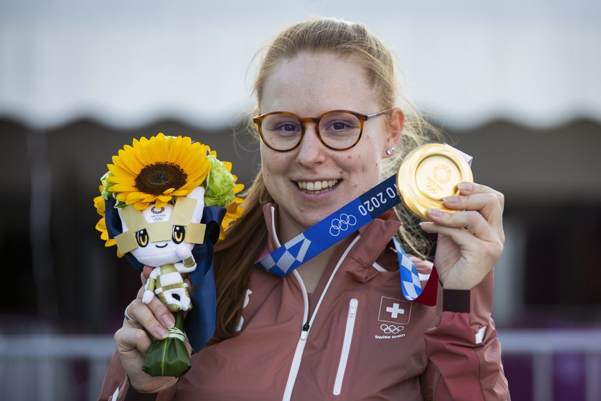 Nina Christen of Switzerland poses with the gold medal after the women's shooting 50m Rifle 3 Positions Finals at the 2020 Tokyo Summer Olympics in Tokyo, Japan, on Saturday, July 31, 2021. (KEYSTONE/ ...