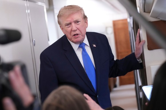 President Donald Trump speaks to reporters onboard Air Force One while returning to the White House, Sunday, Aug. 2, 2026. (AP Photo/Jacquelyn Martin)
Donald Trump
