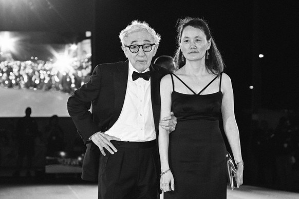VENICE, ITALY - SEPTEMBER 04: (EDITORS NOTE: Image has been converted to black and white.) Woody Allen and Soon-Yi Previn attend a red carpet for the movie &quot;Coup De Chance&quot; at the 80th Venic ...