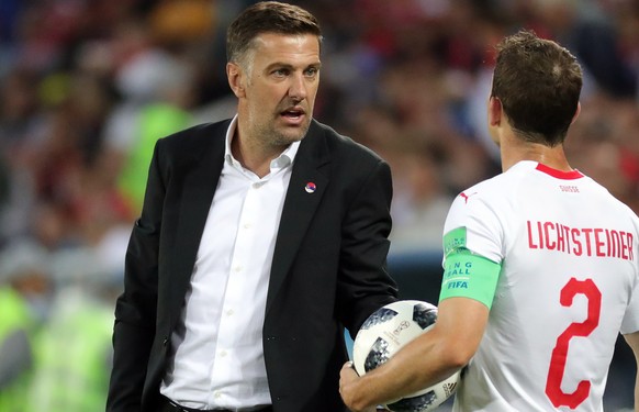 epa06831911 Serbia&#039;s coach Mladen Krstajic (L) and Stephan Lichtsteiner of Switzerland react during the FIFA World Cup 2018 group E preliminary round soccer match between Serbia and Switzerland i ...