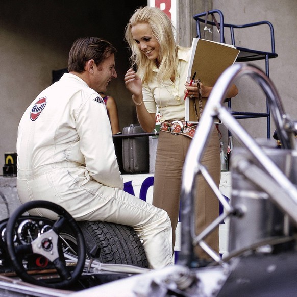 1969 Italian GP AUTODROMO NAZIONALE MONZA, ITALY - SEPTEMBER 07: Sally Courage talks to Bruce McLaren during the Italian GP at Autodromo Nazionale Monza on September 07, 1969 in Autodromo Nazionale Mo ...