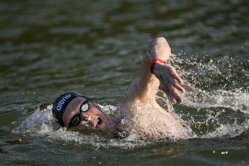 Germany's Florian Wellbrock competes during the marathon swimming men's 10km competition at the 2024 Summer Olympics, Friday, Aug. 9, 2024, in Paris, France. (AP Photo/Vadim Ghirda)
