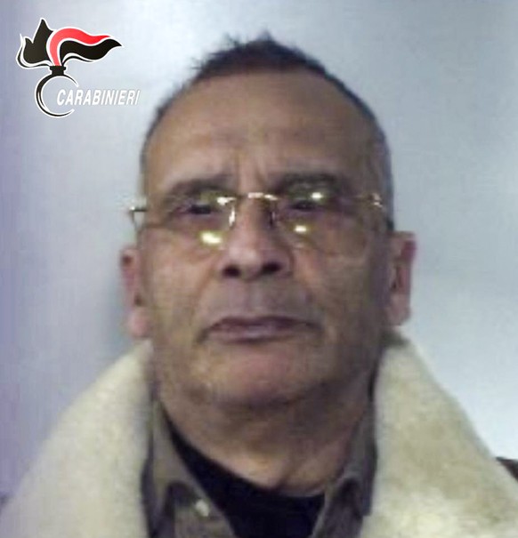 Italian Carabinieri handout photo made available on Monday, Jan. 16, 2023, of top Mafia boss Matteo Messina Denaro seen soon after his arrest Monday, Jan. 16, 2023, at a private clinic in Palermo, Sic ...